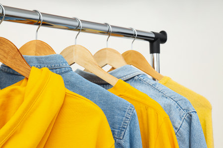 Wardrobe rack with different clothes, concept of different clothesの写真素材