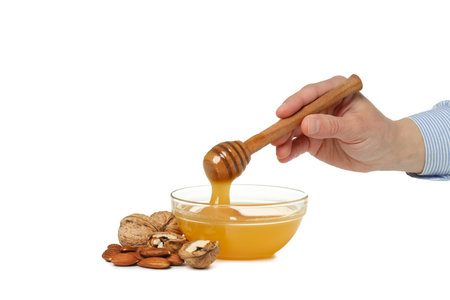 PNG, Honey with nuts, isolated on white backgroundの写真素材
