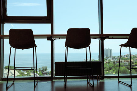 A place to work near the window, high chairsの写真素材