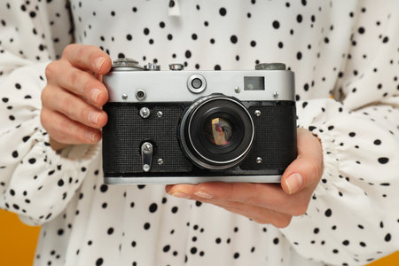 Concept of leisure and photo hobby with retro photo cameraの写真素材