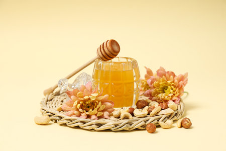 Concept of tasty and sweet food - honey with nutsの写真素材