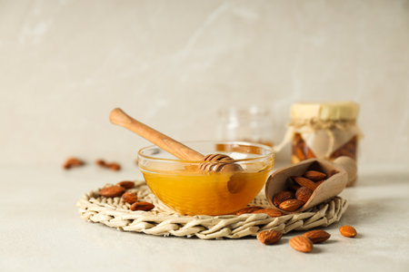 Concept of tasty and sweet food - honey with nutsの写真素材