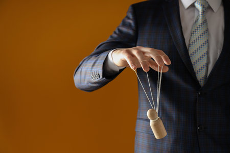 Concept of control and dictatorship, management conceptの写真素材