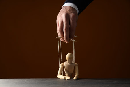 Concept of control and dictatorship, management conceptの写真素材
