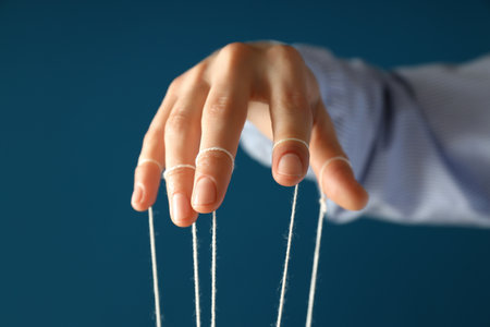 Concept of control and dictatorship, management conceptの写真素材