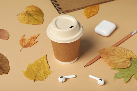 Concept of freelance, composition with hot drink and headphonesの写真素材