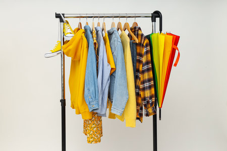 Wardrobe rack with different clothes, concept of different clothesの写真素材