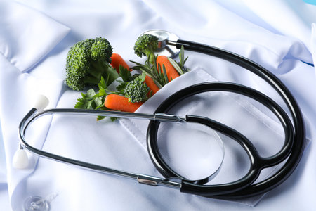 Stethoscope on a doctor's white coatの写真素材