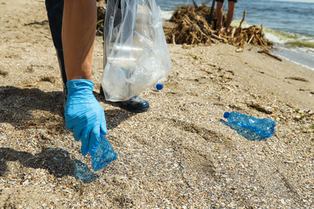People clean up garbage on the banks of the river, environmental protectionの写真素材