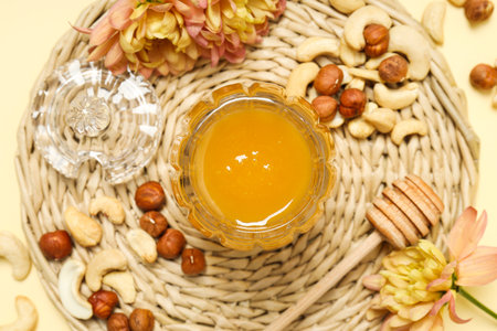 Concept of tasty and sweet food - honey with nutsの写真素材