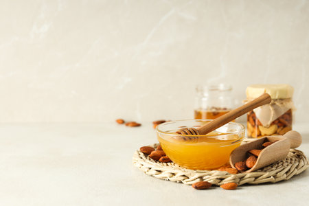 Concept of tasty and sweet food - honey with nutsの写真素材