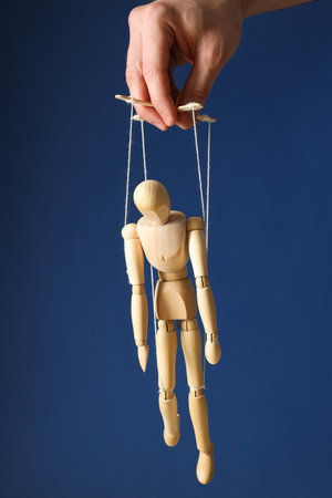 The concept of control and dictatorship over peopleの写真素材