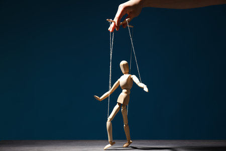 The concept of control and dictatorship over peopleの写真素材