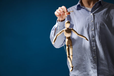 The concept of control and dictatorship over peopleの写真素材