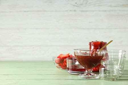 Concept of cooking tasty and sweet food - strawberry jamの写真素材