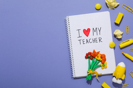Notebook with the inscription "I love my teacher!"の写真素材