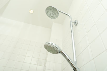 Shower cabin in the bathroom in the apartment