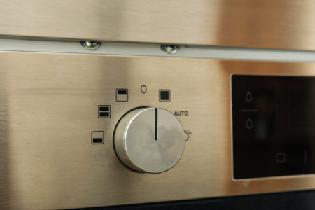 A close-up of the control panel of a modern dishwasher