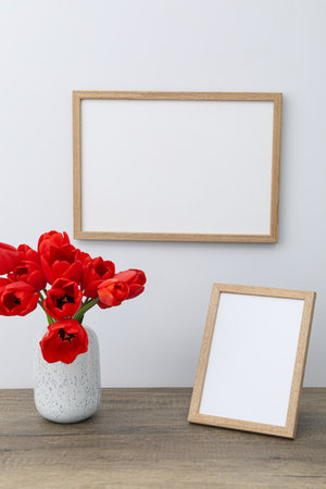 Wall and table frame with vase of flowers