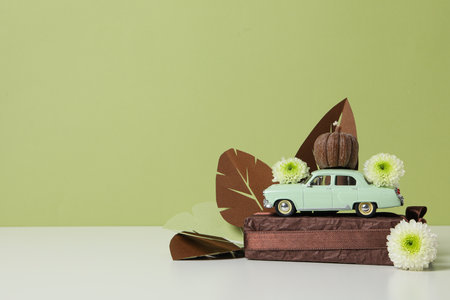 Autumn or fall travel and vacation concept with carの写真素材