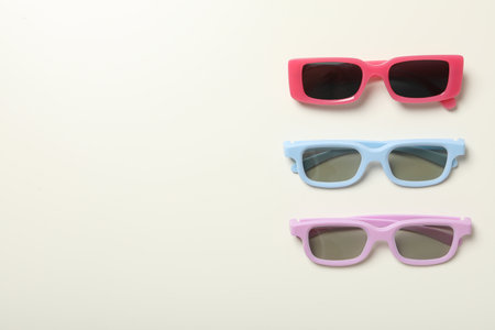 Colorful sunglasses on white background, space for textの写真素材
