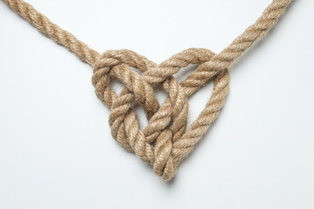 Celtic knot in the shape of a rope heart. Concept of creative unity, faith and protection.