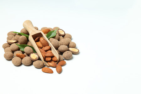 Tasty and sweet food - almonds in chocolateの写真素材