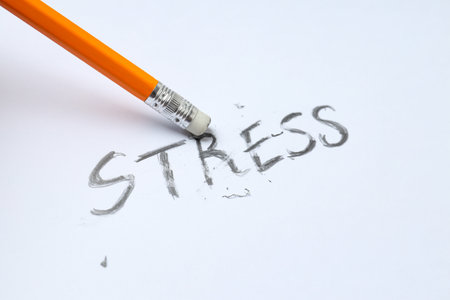 Word Stress and pencil on white background