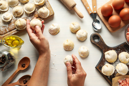 Cooking home food concept with raw dumplingsの写真素材