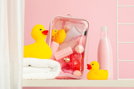 Bathroom shelf with tools yellow rubber ducks.の写真素材