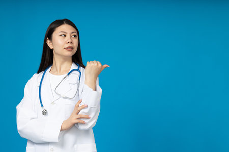 Asian girl doctor in a white coatの写真素材