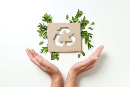 Sign of recycling of kraft cardboard, environmental protection. smart use of resources.の写真素材
