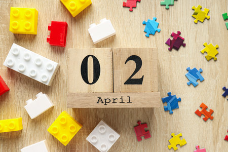 Multicolored puzzle pieces and legos on a light background. world autism day conceptの写真素材