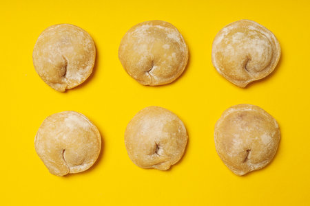 Cooking home food concept with raw dumplingsの写真素材