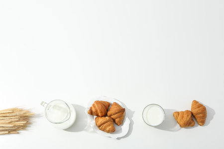 Breakfast tasty food concept - milk with bakery productsの写真素材