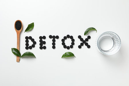 The word "Detox" from activated charcoal tabletsの写真素材