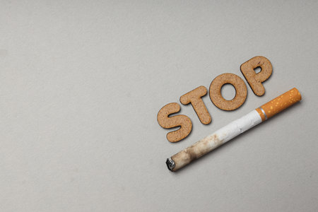 Smoking addiction concept, word: STOP, top view.の写真素材