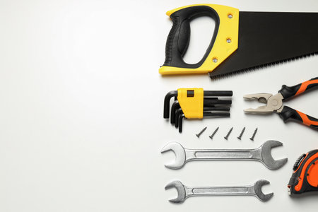 Construction tools on white background, space for textの写真素材