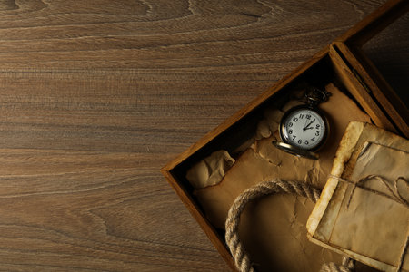 Columbus day. A pocket watch with a stack of old lettersの写真素材