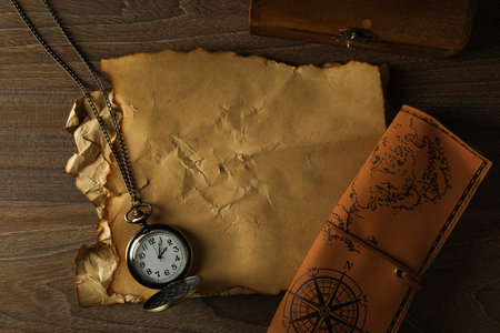 Columbus Day. Vintage pocket watch with an old sheet of paperの写真素材