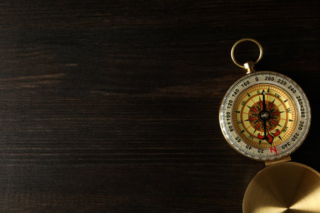 Sea travel concept. Vintage compass on the tableの写真素材