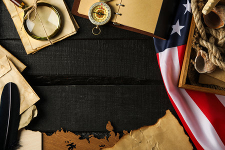 Columbus day. Magnifying glass with compass and mapの写真素材