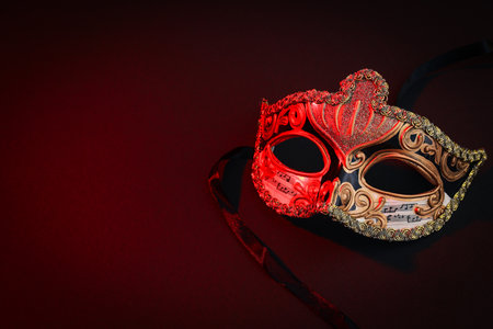 Carnival mask on dark background, space for textの写真素材