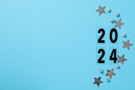 The concept of celebrating the New Year 2024, the inscription on a light background