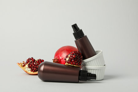 Self care and skincare products concept - pomegranate cosmetics