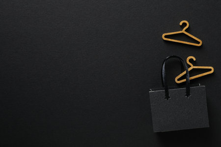 Black Friday concept, thumbnail, hanger and paper bag for shopping.の写真素材