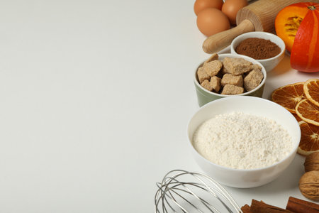 The ingredients are laid out on the table for preparing autumn pastries.の写真素材