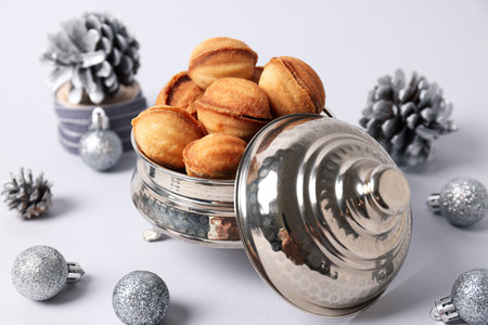 Cookies Nuts in a silver bowl with cones