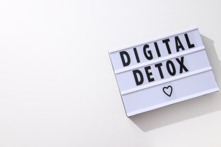 The inscription "digital detoxification" on a white boardの写真素材