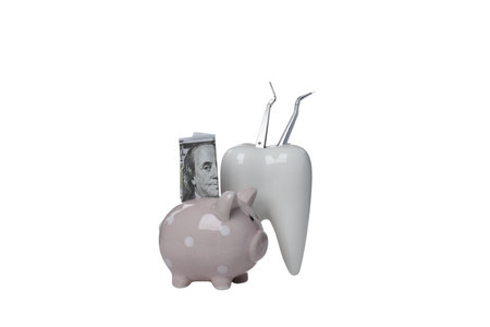 PNG, Tooth with dental instruments and piggy bank with cash, isolated on white backgroundの写真素材